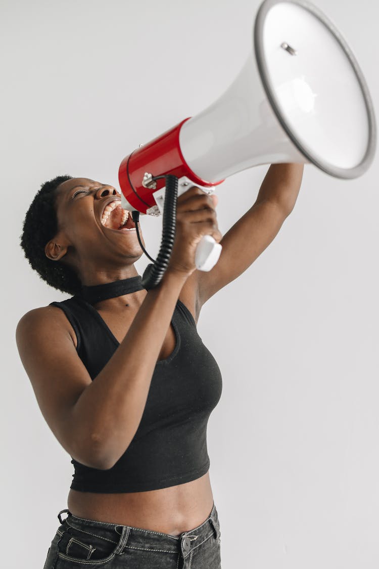 Woman Protesting Through A Megaphone