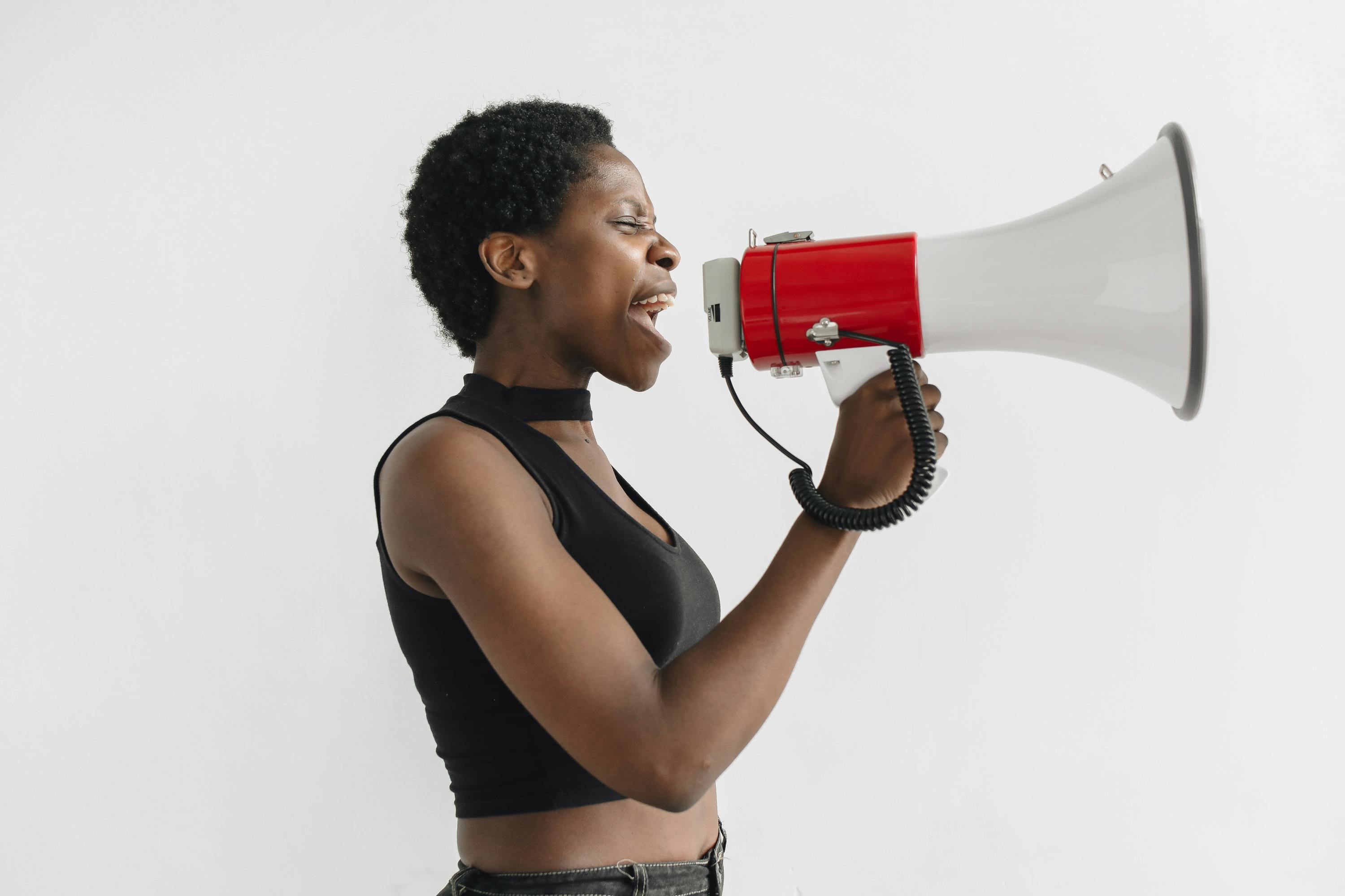 woman protesting through a megaphone