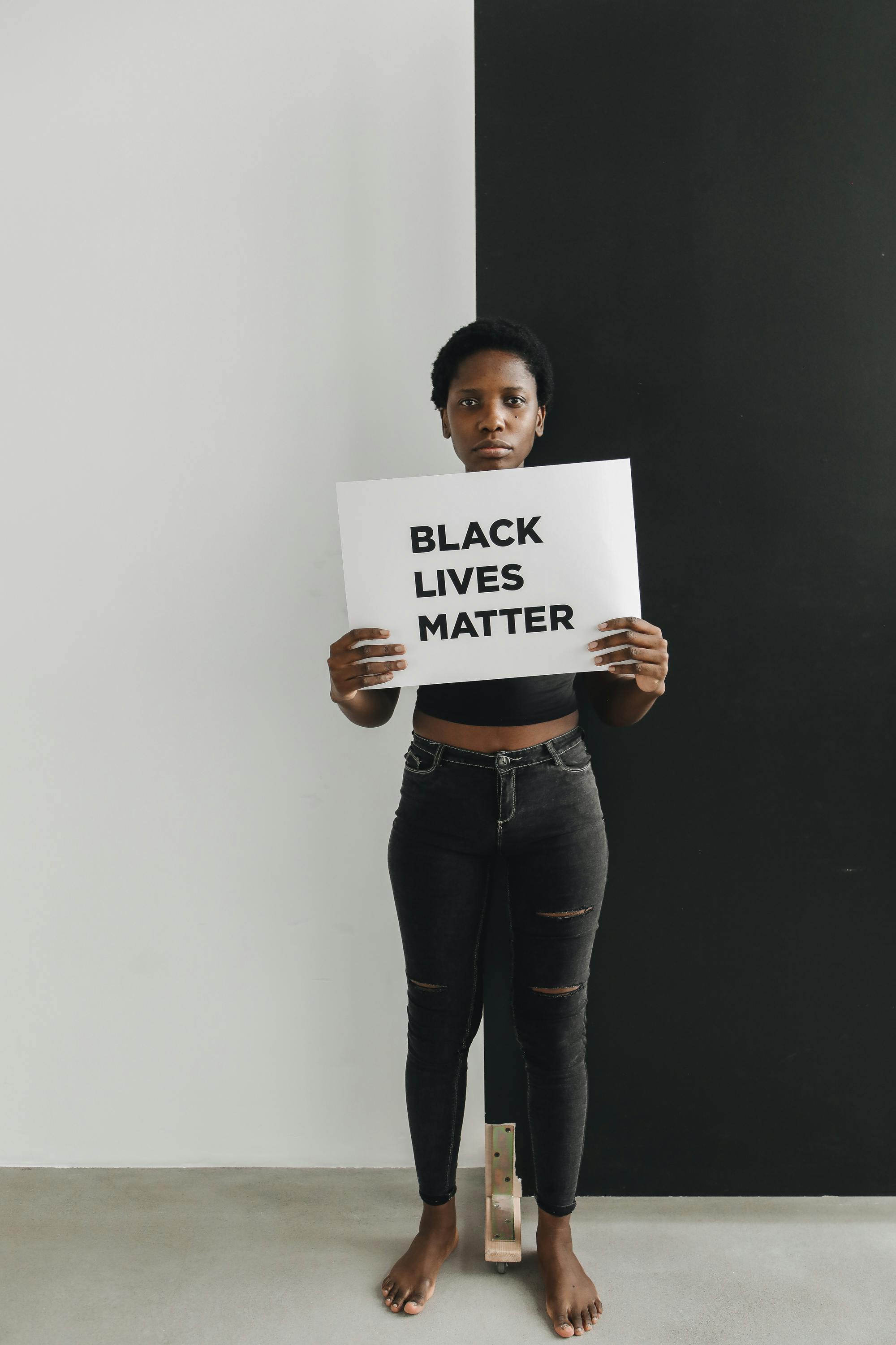 woman holding a placard