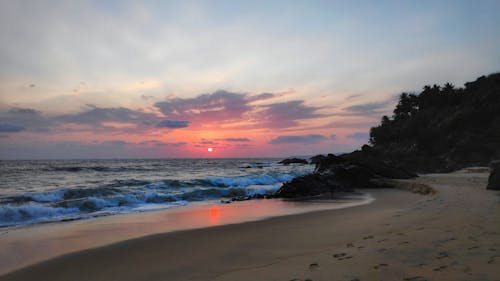 Δωρεάν στοκ φωτογραφιών με όμορφο ηλιοβασίλεμα, παραλία, παραλία ηλιοβασίλεμα