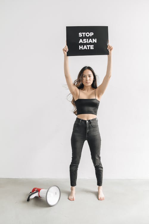 Free Woman Holding a Signage Stock Photo