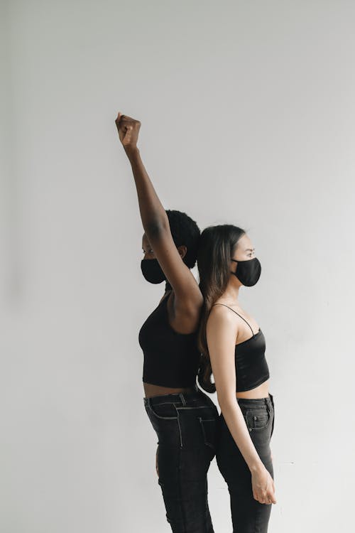 Two Women Standing Close Together