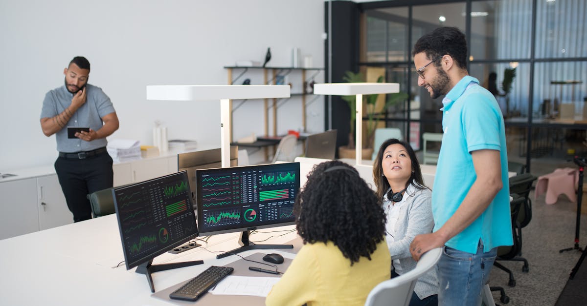 diverse team of professionals working alongside holographic AI assistants in a modern open office