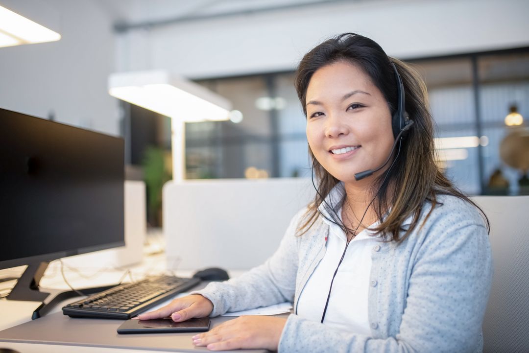 A medical office front desk staffer scheduling a patient appointment by phone