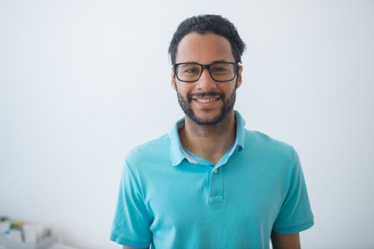 Man in Blue Polo Shirt Wearing Black Framed Eyeglasses