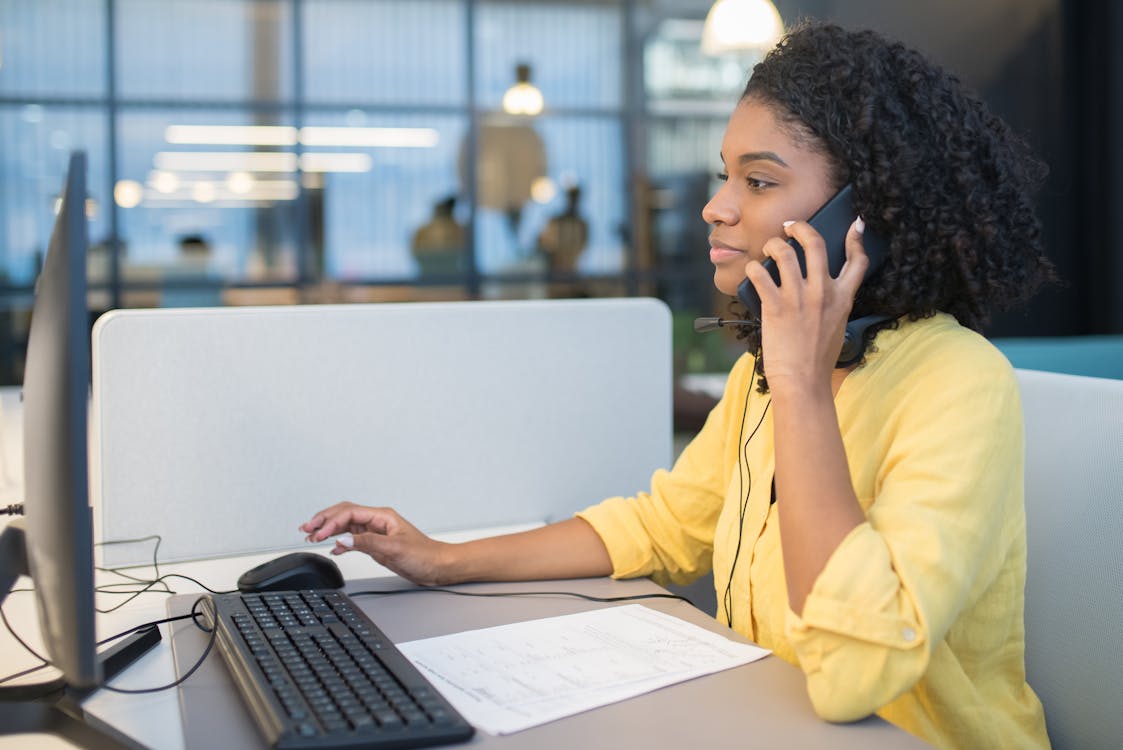 Free Woman Taking a Phone Call Stock Photo