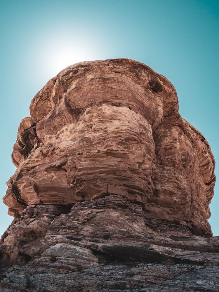 Rock Cliff On Blue Sky Background