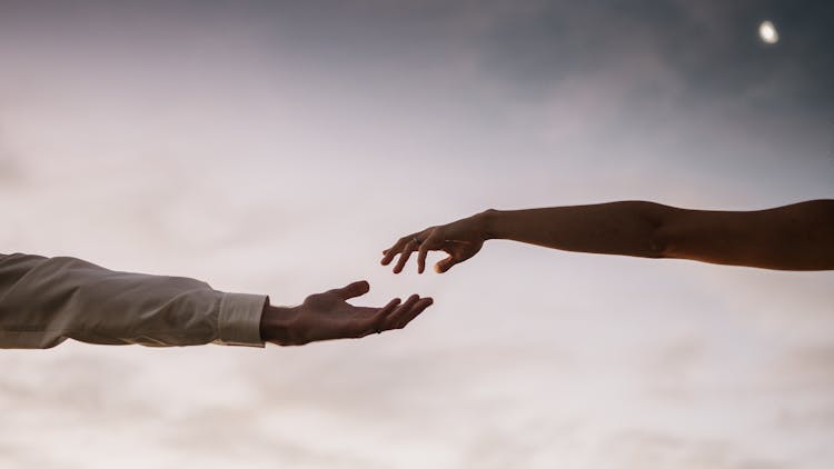 Couple With Hands Apart