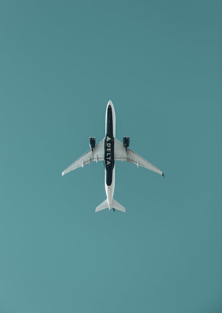 White  Airplane In A Blue Sky