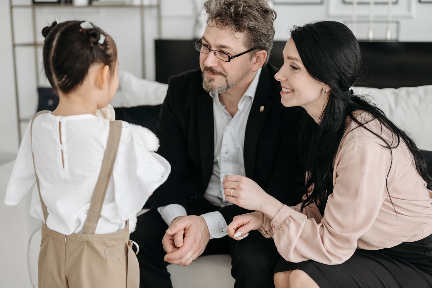 Adult calmly helping a child name their feelings