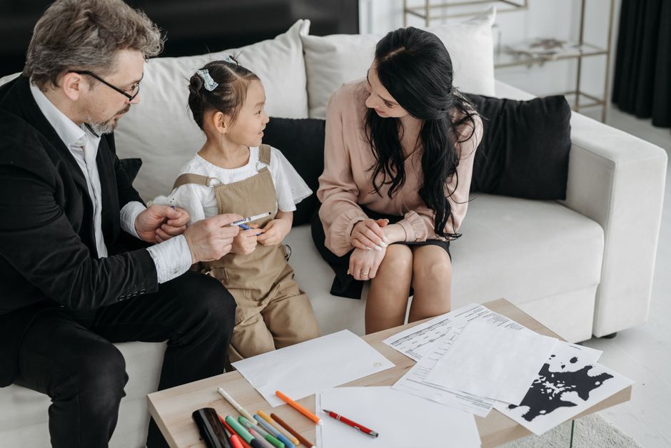 Photo by Pavel Danilyuk on Pexels A family chatting happily on a living room couch, fostering togetherness and love. - Photo by Pavel Danilyuk on Pexels
