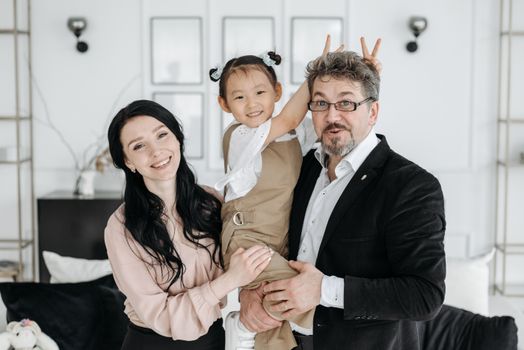 Happy Family Smiling to the Camera
