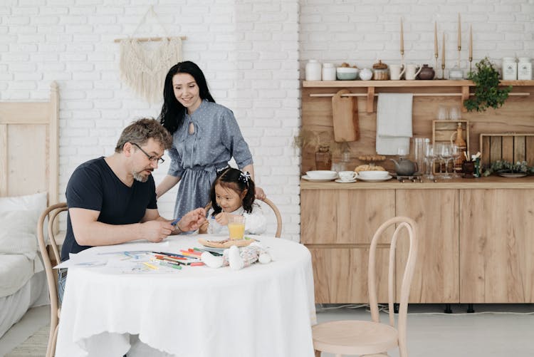 Foster Parents Playing With Child