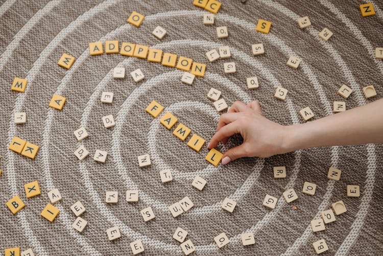 Scrabble Tiles On A Floor