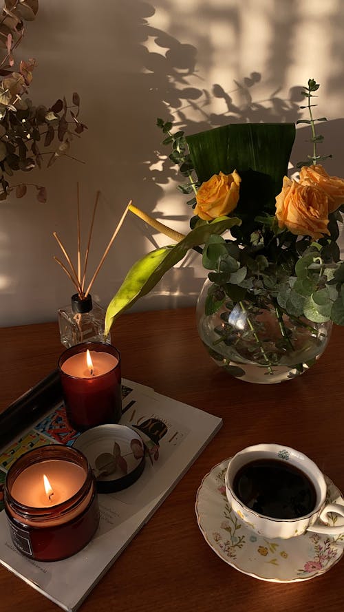 Coffee and Candles on Table