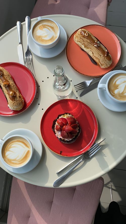 Free Vibrant breakfast setup featuring coffee and pastries at a cozy cafe in Istanbul, Turkey. Stock Photo