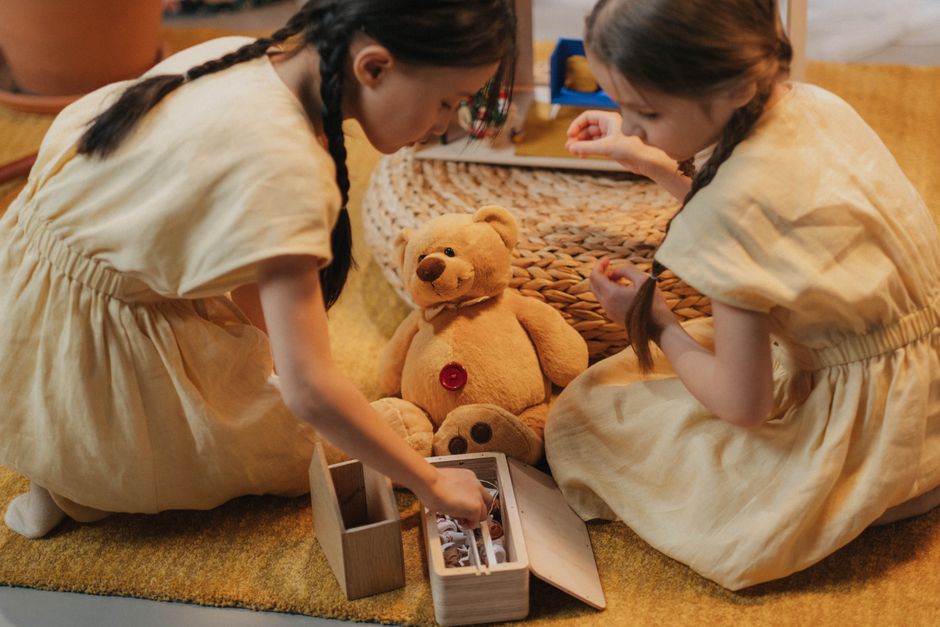 children sharing toys