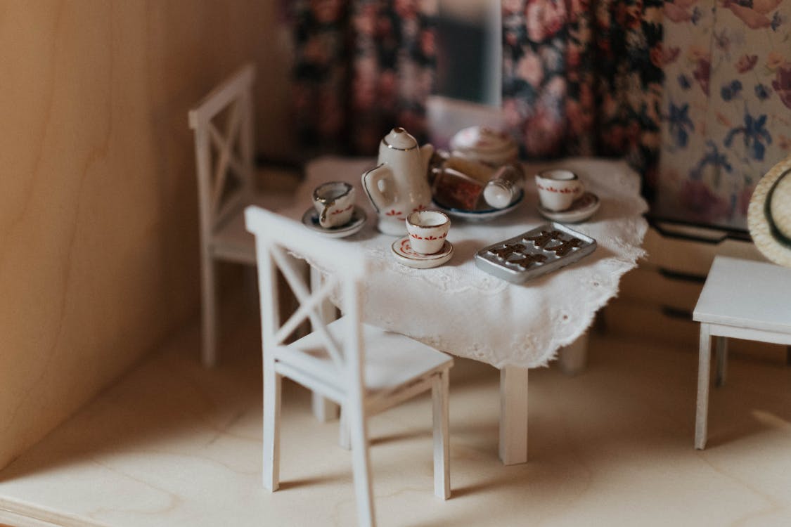 White Ceramic Teacup on White Wooden Table