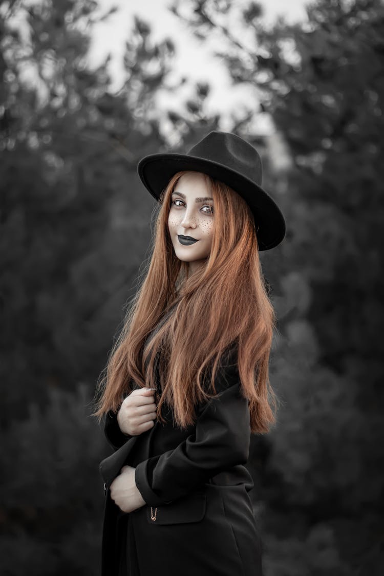 Redhead Woman Wearing All Black 