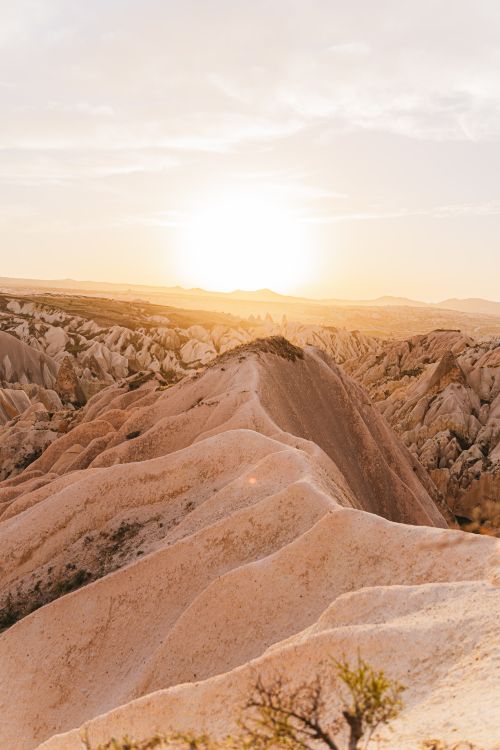 Free A breathtaking view of the rocky formations in Cappadocia at sunset, showcasing nature's beauty. Stock Photo