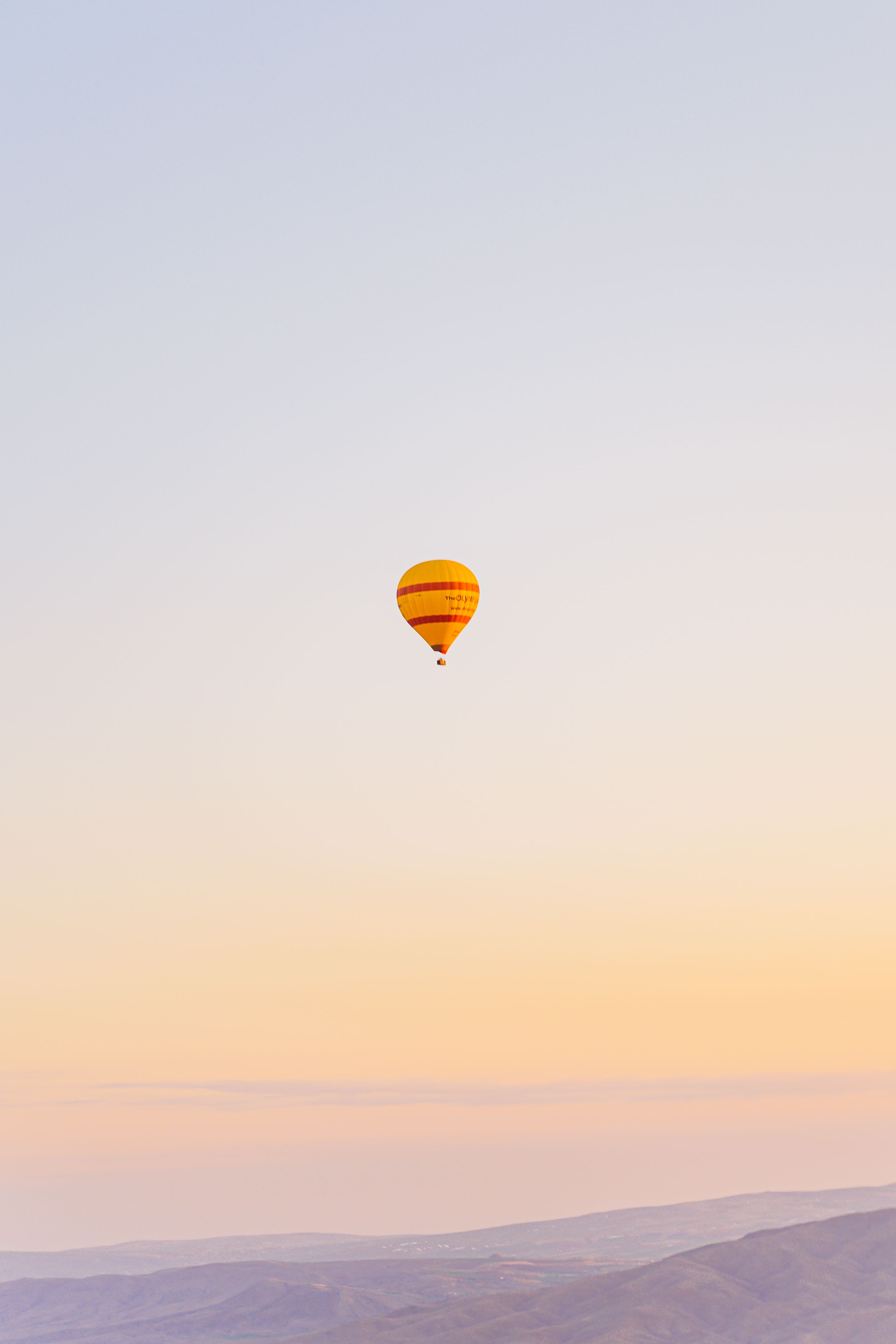 Yellow Hot Air Balloon in the Sky · Free Stock Photo