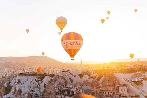 Hot Air Balloons Flying over the City