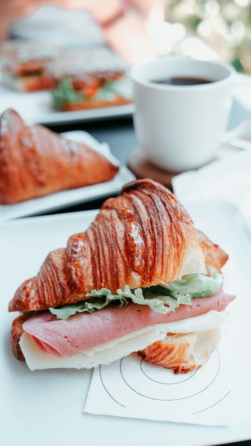 Delicious croissant with ham and cheese