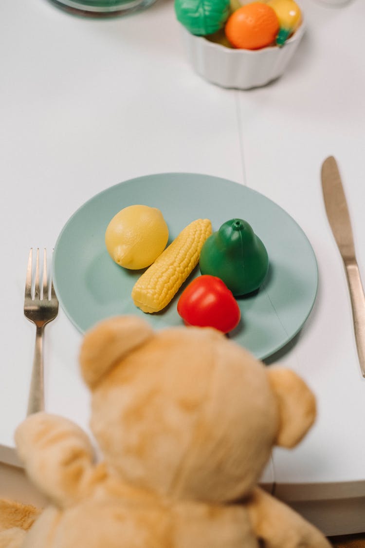 A Plastic Toys On The Plate