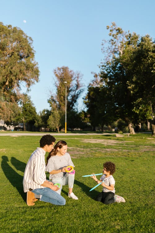 Couple Playing with Their Kid