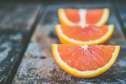 Free Three Sliced Orange Fruits Stock Photo