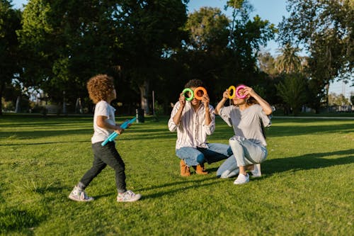 Family Playing in the Park with Toys