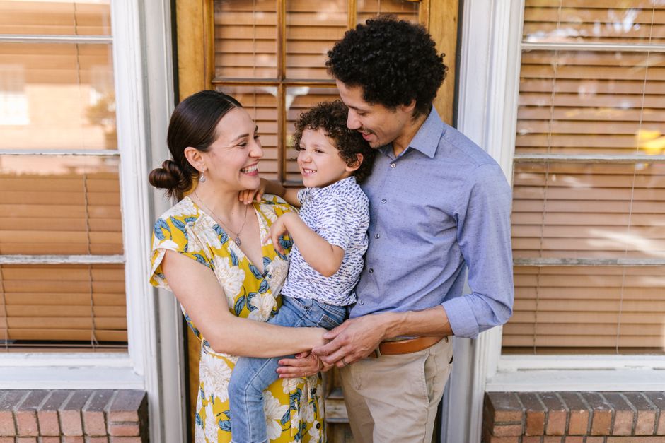 family standing in front yard