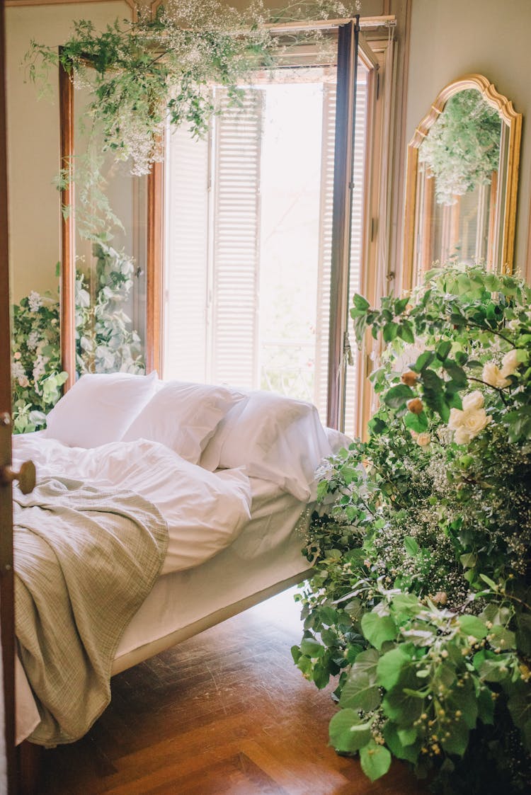Photo Of Bedroom With Flowering Plants