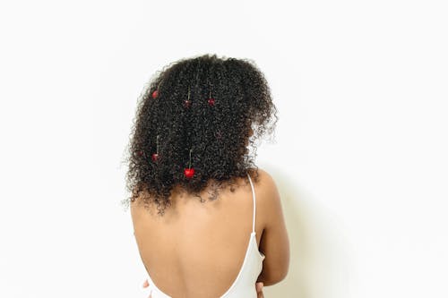A Woman With Cherries on Her Hair 