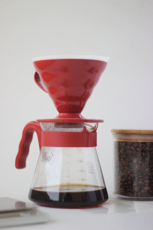 Free Red and Clear Glass Coffee Dripper Stock Photo