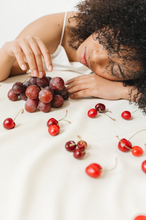 Portrait of a Woman with Red Fruits