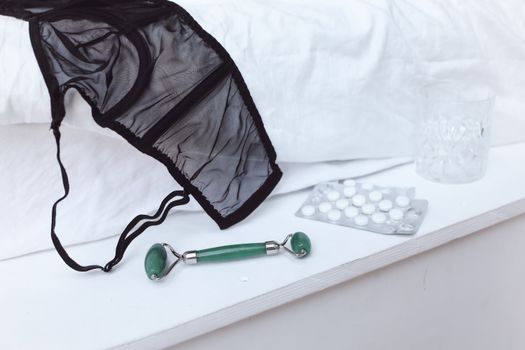 Black and Green Umbrella on White Textile