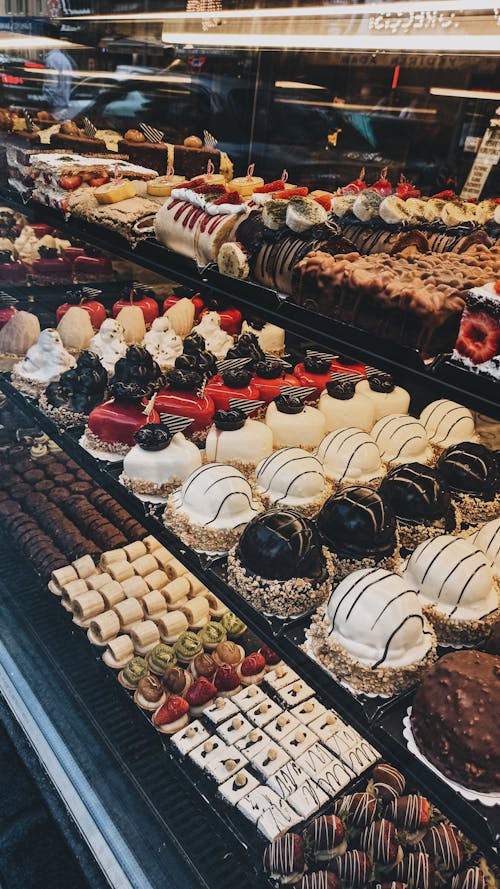 Display of Gourmet Cakes and Sweets in a Bakery 