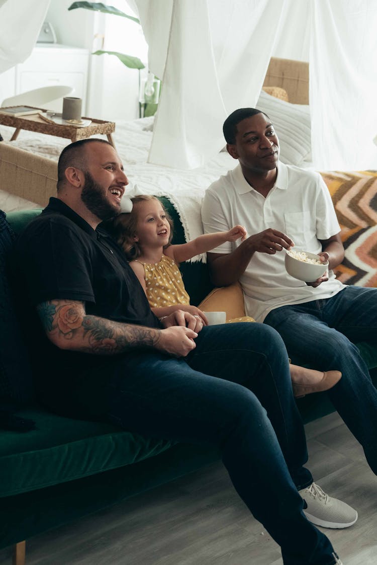 Happy Family Watching Television Together