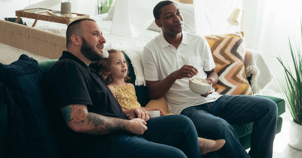family watching streaming services together on couch