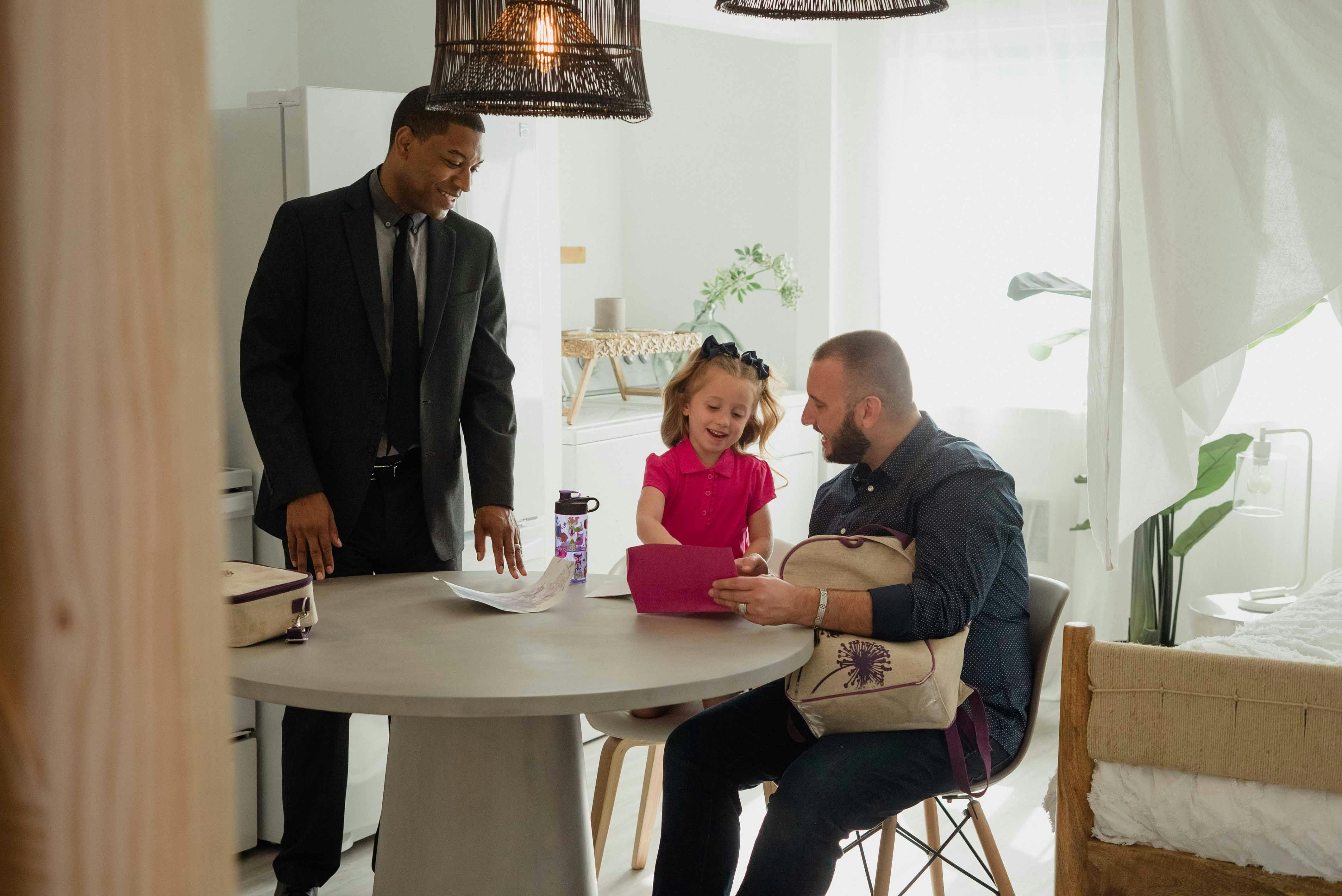 a couple with their daughter