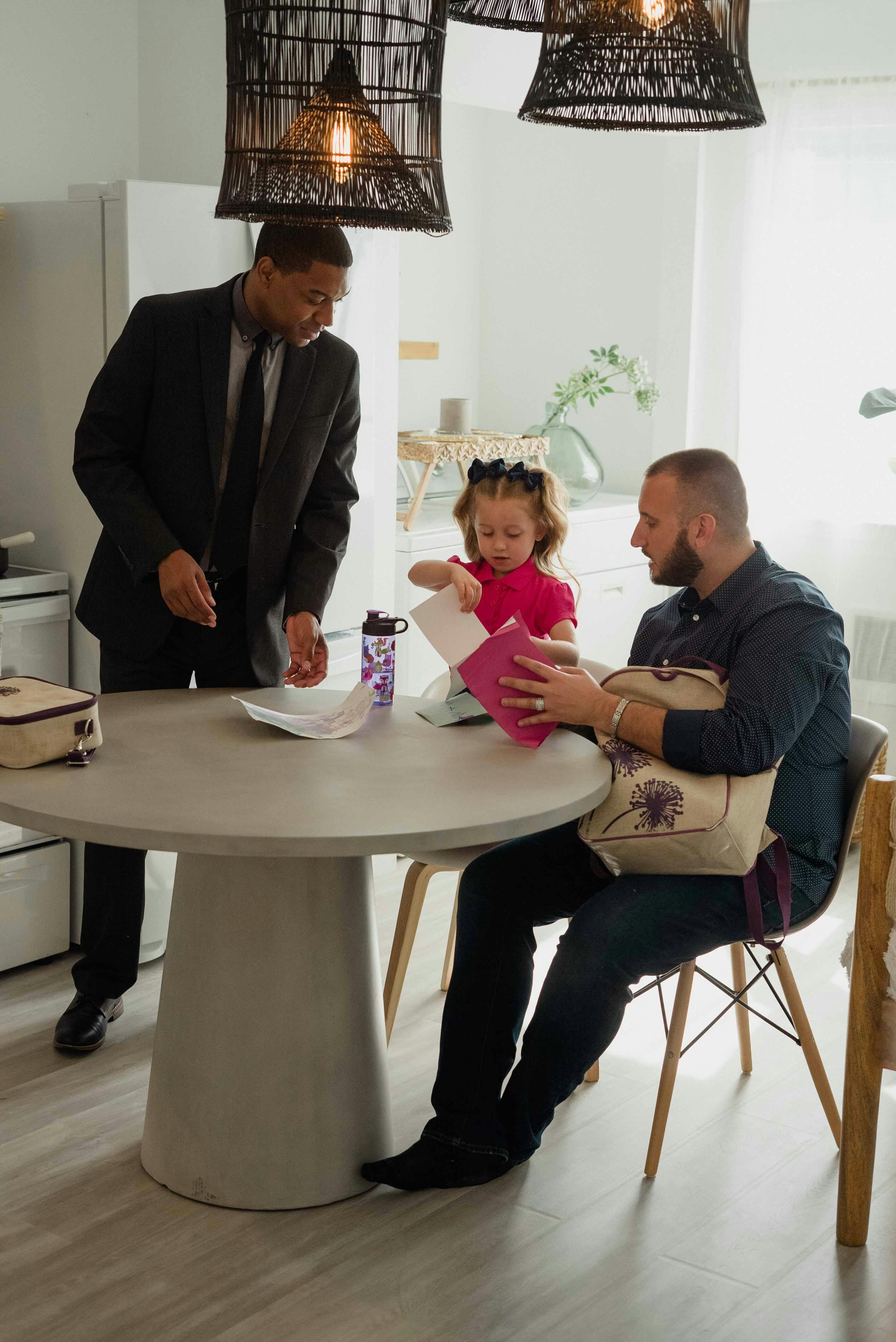 a couple with their daughter