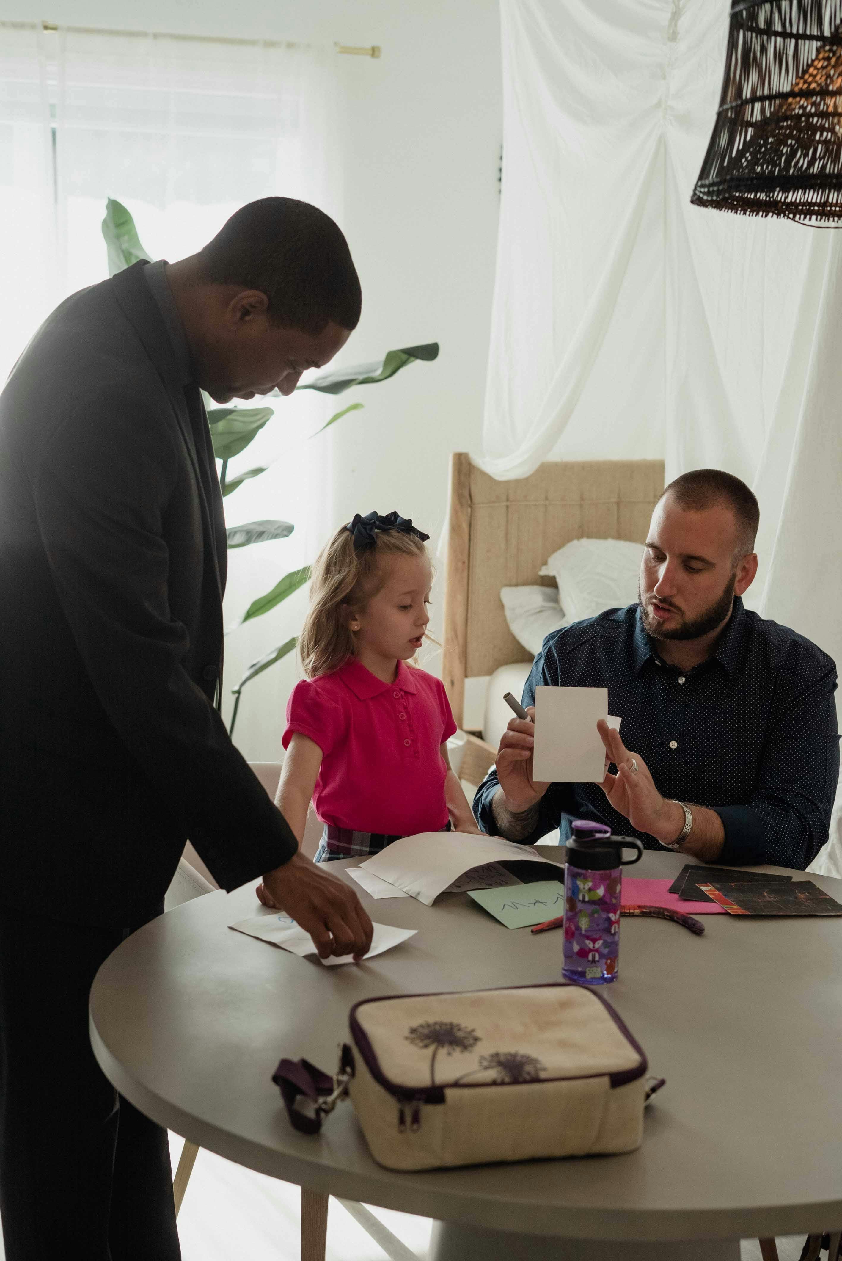 a couple with their daughter