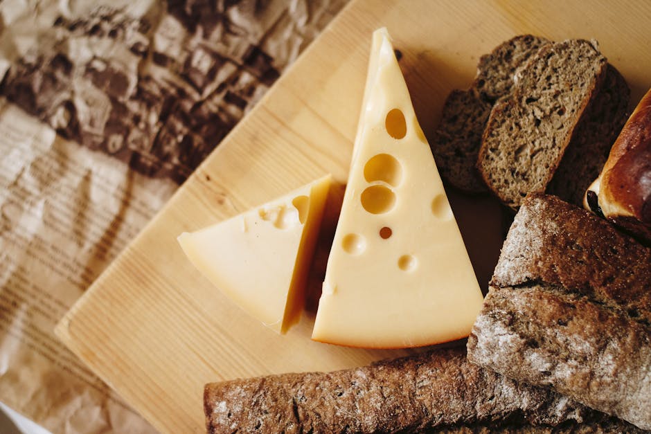 Sliced Cheese on Brown Table Top