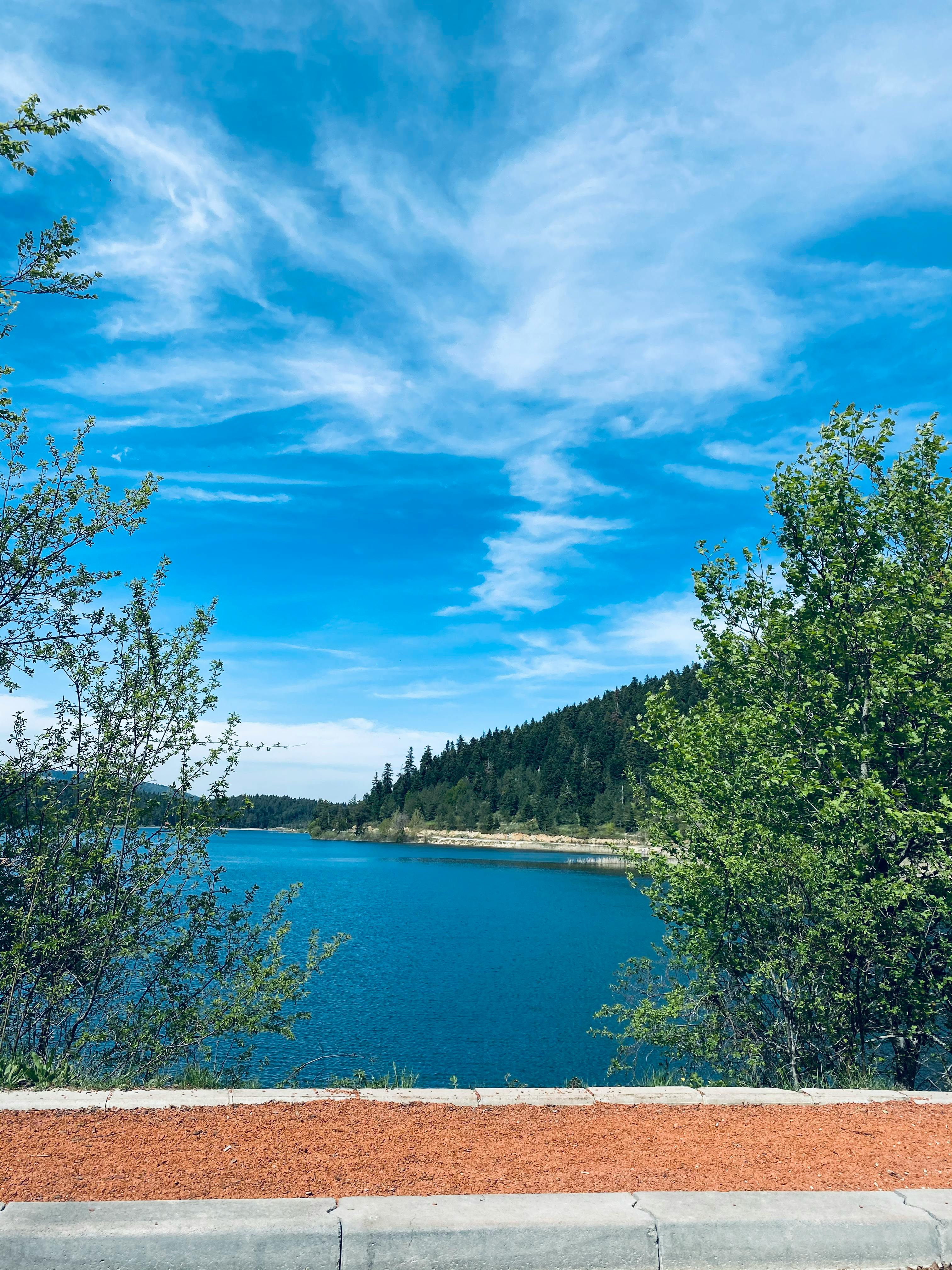 Layering berries and granola over a creamy cottage cheese base