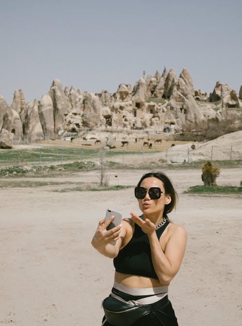 A Woman Taking a Selfie in Cappadocia