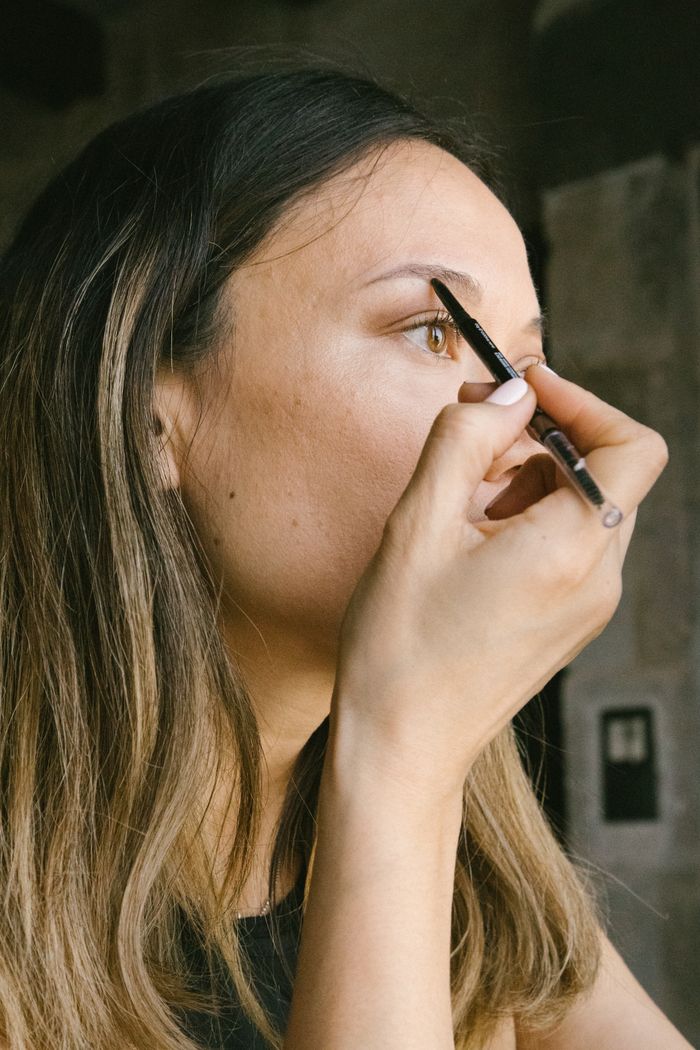 Freshly shaped brow beside an eyebrow pencil