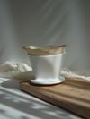 Ceramic coffee dripper — photo by ly on Pexels