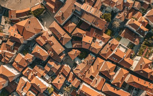 Free Explore the charming terracotta rooftops of Budva, Montenegro from a unique aerial perspective. Stock Photo