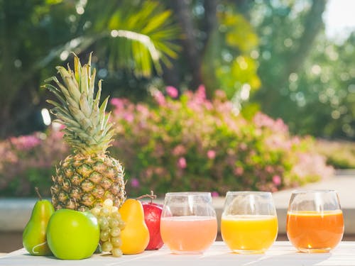 Free Healthy Fruit Juices in Glasses Stock Photo